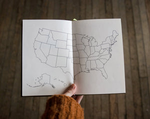 45th Parallel Basecamp Journal open to US map page