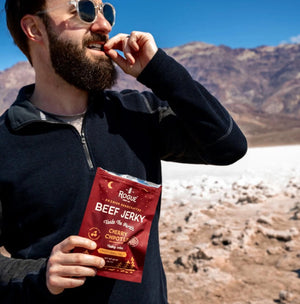 Rogue Jerky in Cherry Chipotle held outdoors