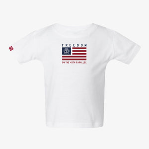 Freedom Flag Infant Tee in Alpine White — front view with horizontal flag graphic