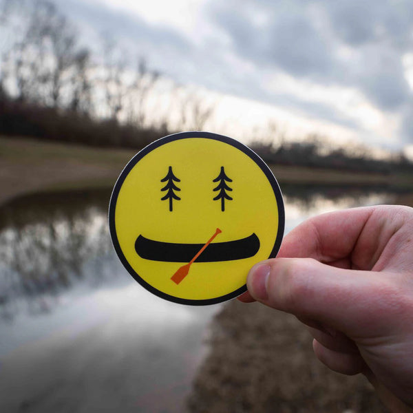 45th Life Canoe Smile Sticker with pine tree eyes and canoe grin