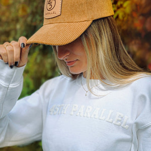 Embossed Crewneck in Summit White lifestyle shot